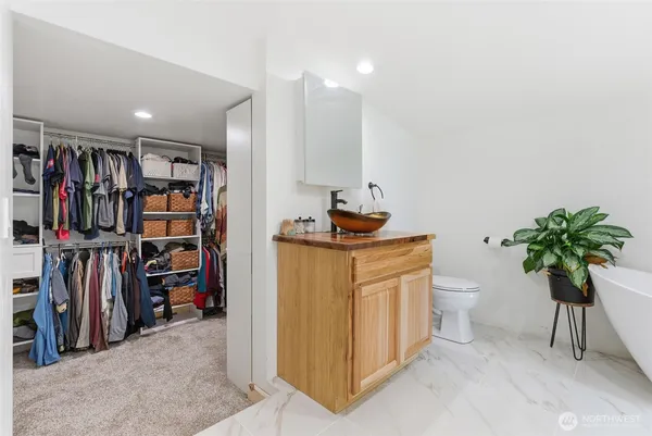 a view of a room with storage and utility room