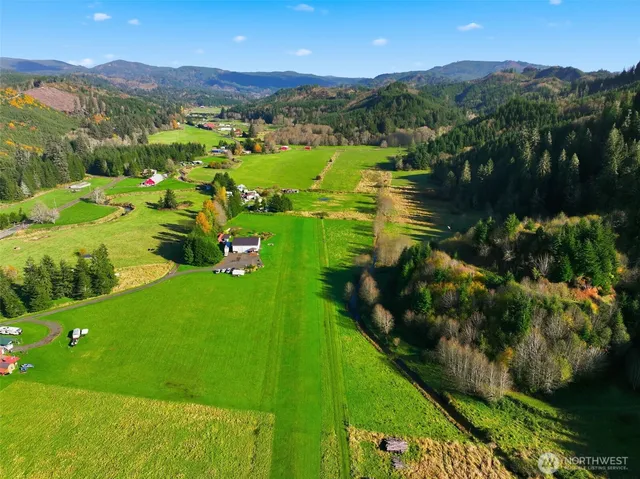 a backyard of a house with oven and garden