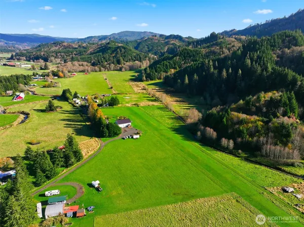 a view of a lush green mountain
