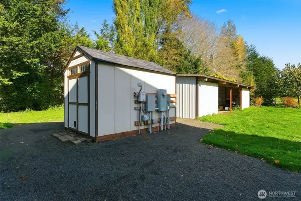a view of a backyard with garden