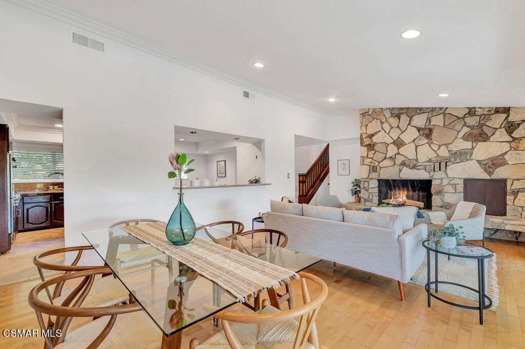 1631 Hauser Circle Thousand Oaks, CA 91362 - Photo 11 of 56 a living room with furniture a fireplace and a flat screen tv