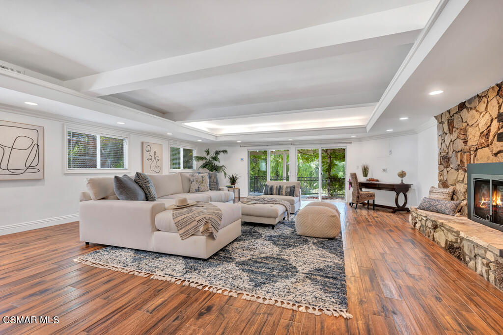 1631 Hauser Circle Thousand Oaks, CA 91362 - Photo 21 of 56 a living room with fireplace furniture and a large window