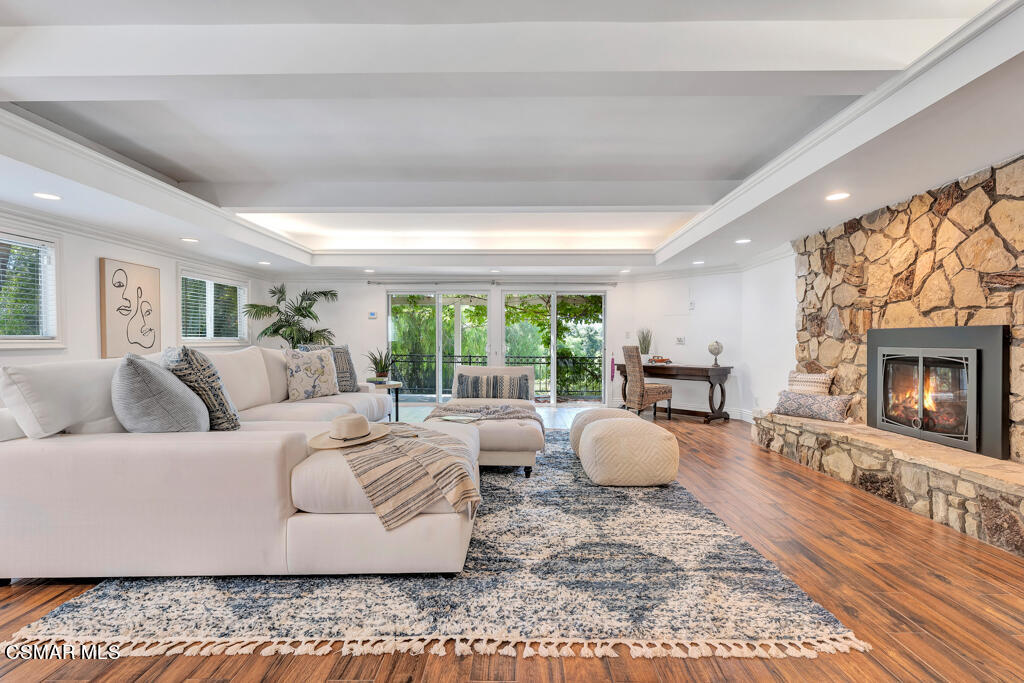 1631 Hauser Circle Thousand Oaks, CA 91362 - Photo 22 of 56 a living room with furniture a large window and a fireplace