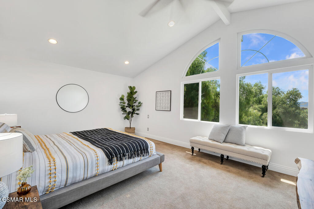1631 Hauser Circle Thousand Oaks, CA 91362 - Photo 27 of 56 a spacious bedroom with a bed and a large window