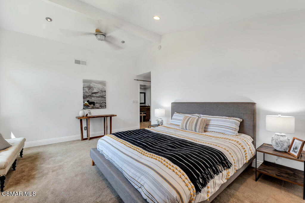 1631 Hauser Circle Thousand Oaks, CA 91362 - Photo 29 of 56 a bedroom with a bed and a potted plant on dresser