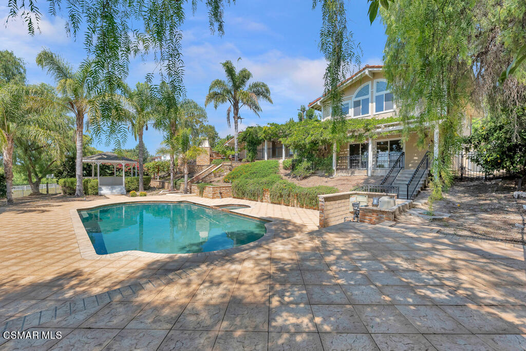 1631 Hauser Circle Thousand Oaks, CA 91362 - Photo 46 of 56 a view of a swimming pool with a patio