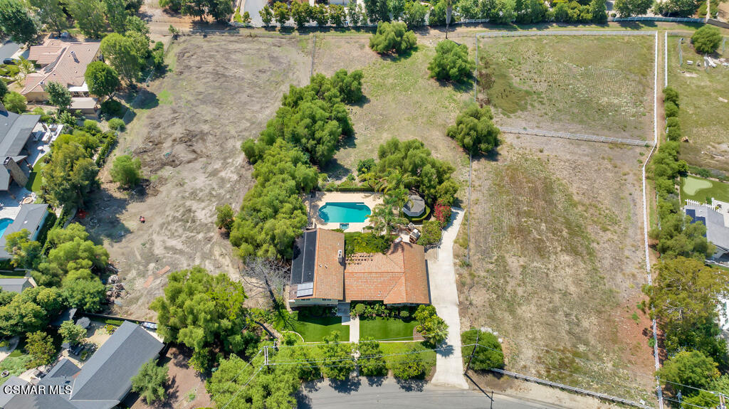 1631 Hauser Circle Thousand Oaks, CA 91362 - Photo 50 of 56 an aerial view of a house with a yard and lake view