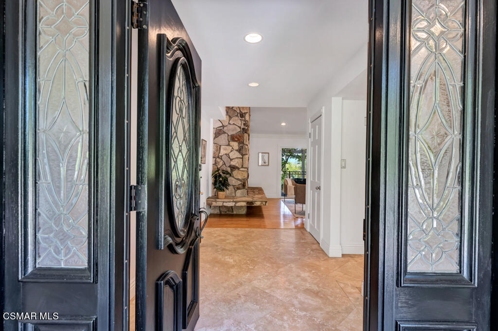 1631 Hauser Circle Thousand Oaks, CA 91362 - Photo 7 of 56 a view of a hallway and a livingroom with furniture