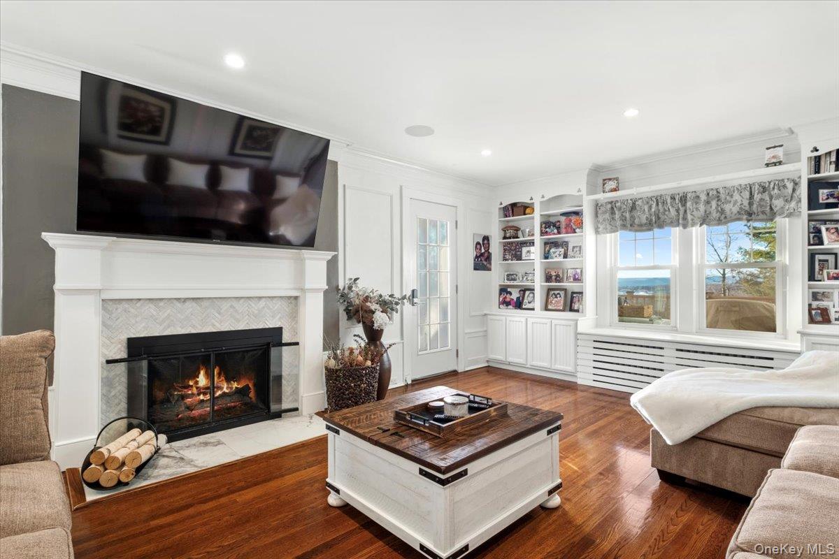 27 Ryder Road Ossining, NY 10562 - Photo 14 of 38 Alternate view of Living Room, Wood Burning Fireplace, Door to Patio