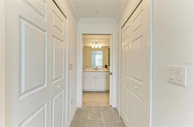 a bathroom with a double vanity sink mirror and shower