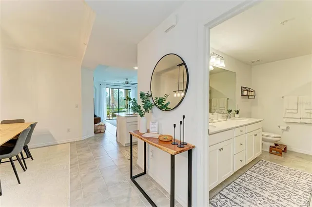 a view of a dining table and chairs in the kitchen