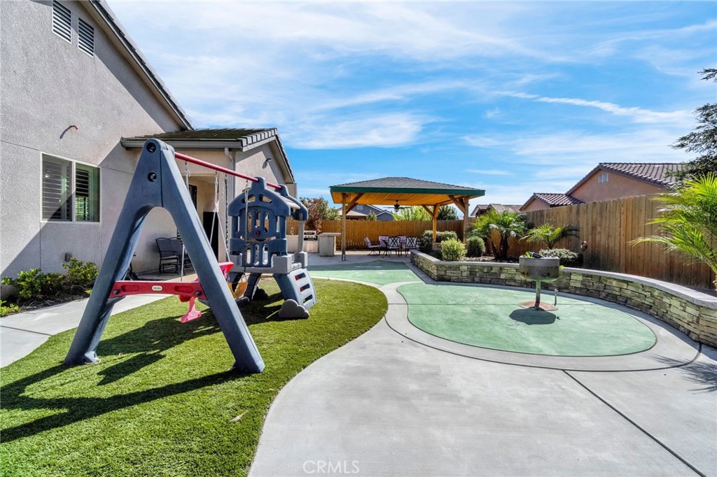 294 Double Tree Court Madera, CA 93637 - Photo 32 of 40 a house view with a garden and entertaining space