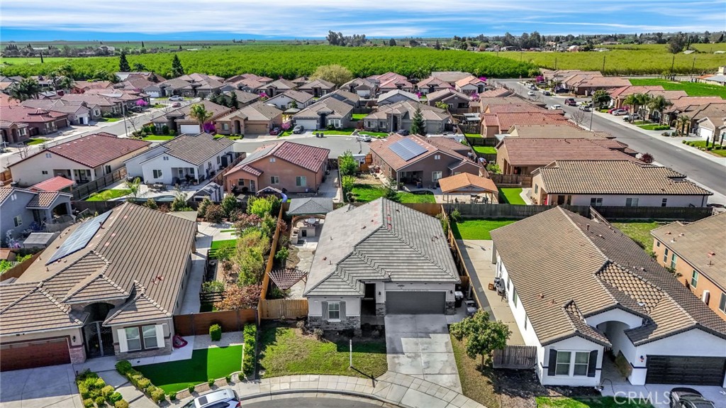294 Double Tree Court Madera, CA 93637 - Photo 34 of 40 an aerial view of a house with a garden