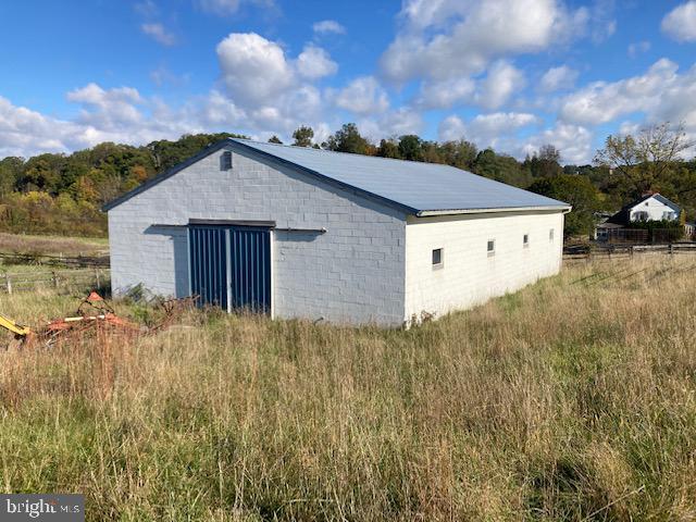 1404 Uniontown Road Westminster, MD 21158 - Photo 17 of 24 a view of a house with a yard