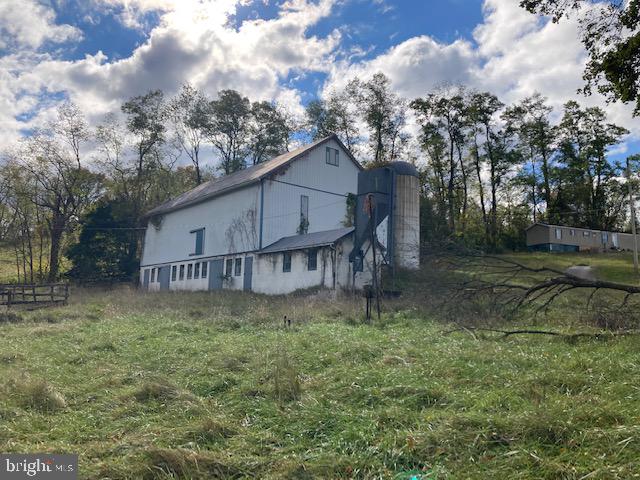 1404 Uniontown Road Westminster, MD 21158 - Photo 20 of 24 a view of a house with a yard