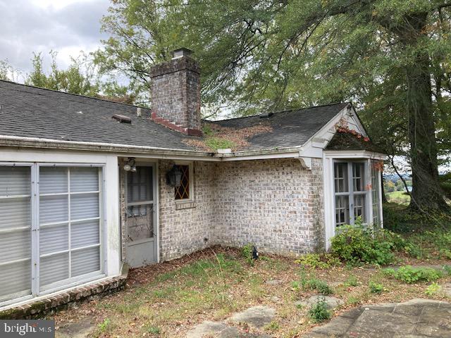 1404 Uniontown Road Westminster, MD 21158 - Photo 23 of 24 a front view of a house with a yard