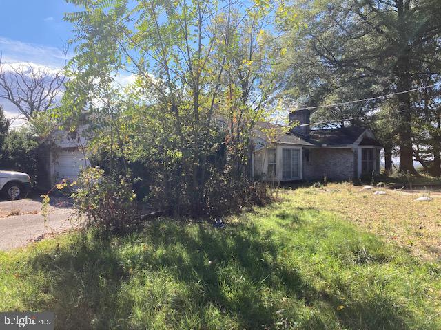 1404 Uniontown Road Westminster, MD 21158 - Photo 6 of 24 a view of a house with a yard