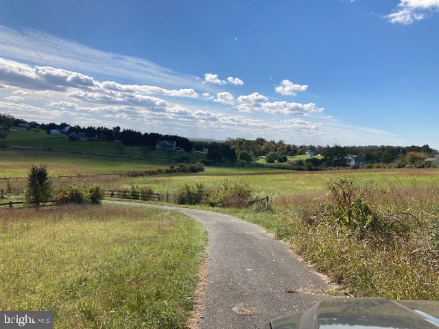 1404 Uniontown Road Westminster, MD 21158 - Photo 9 of 24 a view of a lake with a city