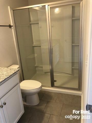 8151 Sheffield Dr. Terrell, NC 28682 - Photo 13 of 15 a bathroom with a toilet and a shower