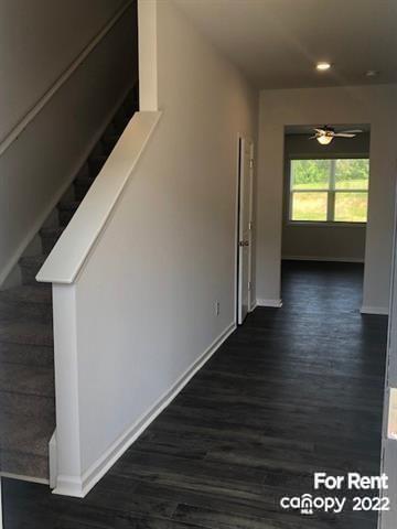 8151 Sheffield Dr. Terrell, NC 28682 - Photo 2 of 15 a view of an empty room with wooden floor and a window