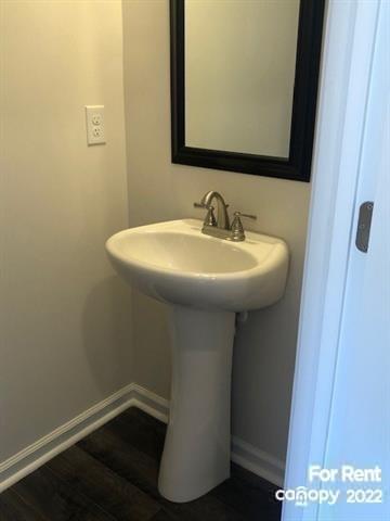 8151 Sheffield Dr. Terrell, NC 28682 - Photo 4 of 15 a bathroom with a sink and a mirror