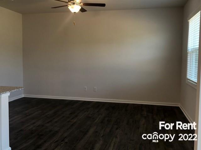 8151 Sheffield Dr. Terrell, NC 28682 - Photo 6 of 15 an empty room with wooden floor and fan