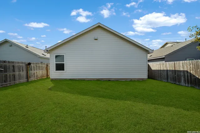 a front view of house with yard and porch