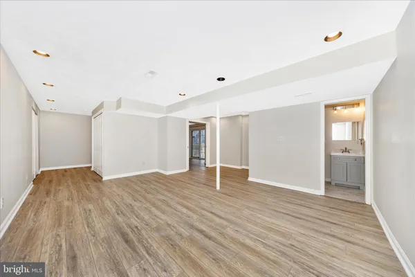 a view of a room with cabinet and flat screen tv