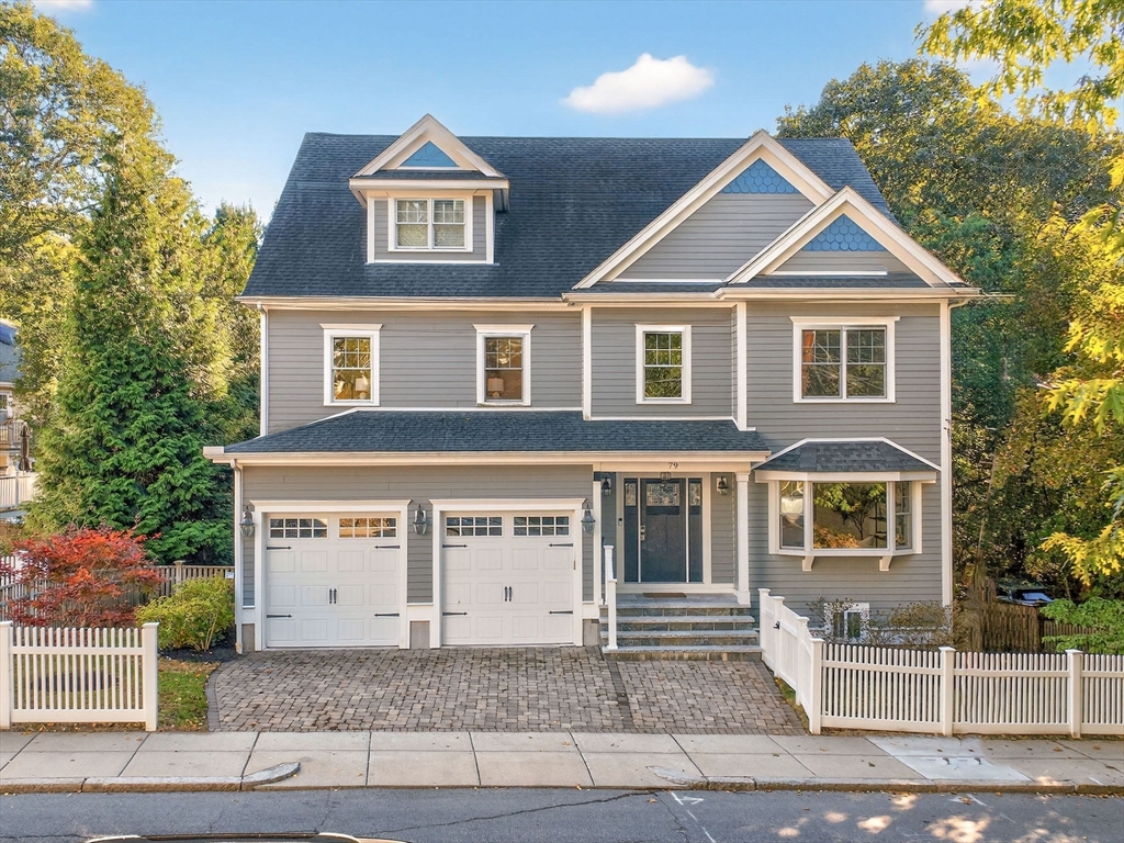 79 Peter Parley Road Boston, MA 02130 - Photo 1 of 38 a front view of a house with a yard