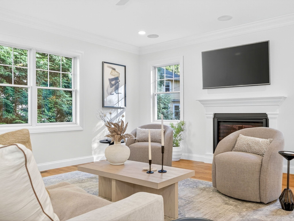 79 Peter Parley Road Boston, MA 02130 - Photo 16 of 38 a living room with furniture fireplace and flat screen tv