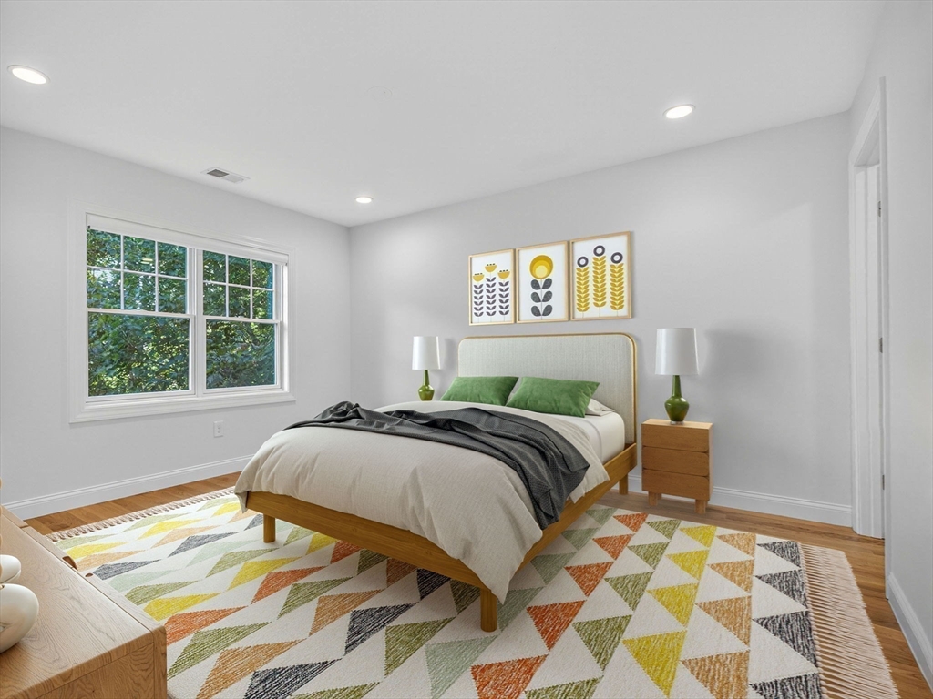 79 Peter Parley Road Boston, MA 02130 - Photo 25 of 38 a bedroom with a bed and a window