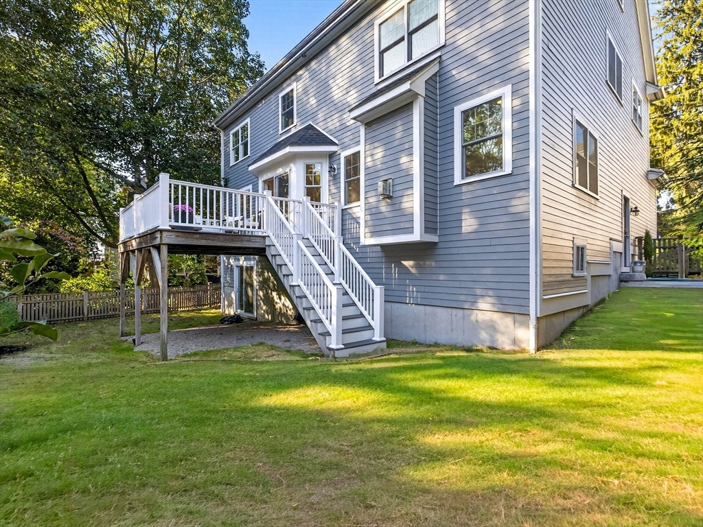 79 Peter Parley Road Boston, MA 02130 - Photo 30 of 38 a view of a house with a yard porch and sitting area