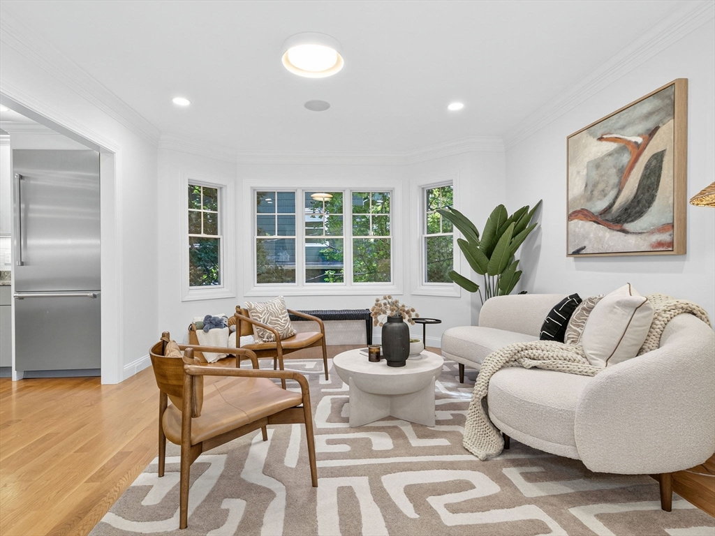 79 Peter Parley Road Boston, MA 02130 - Photo 5 of 38 a living room with furniture and a large window