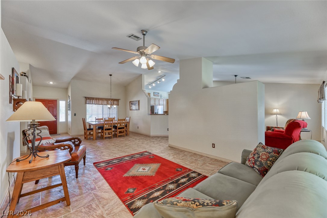 2001 Appaloosa Road Henderson, NV 89002 - Photo 17 of 44 This inviting interior features an open-concept design and neutral tile flooring throughout.