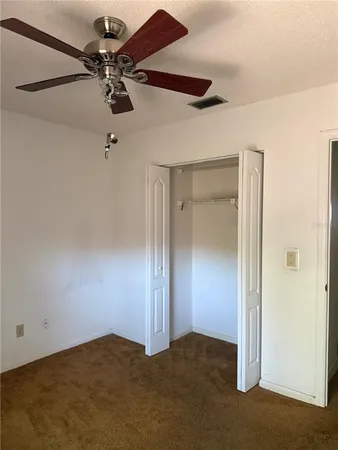 a view of storage and utility room with washer and dryer