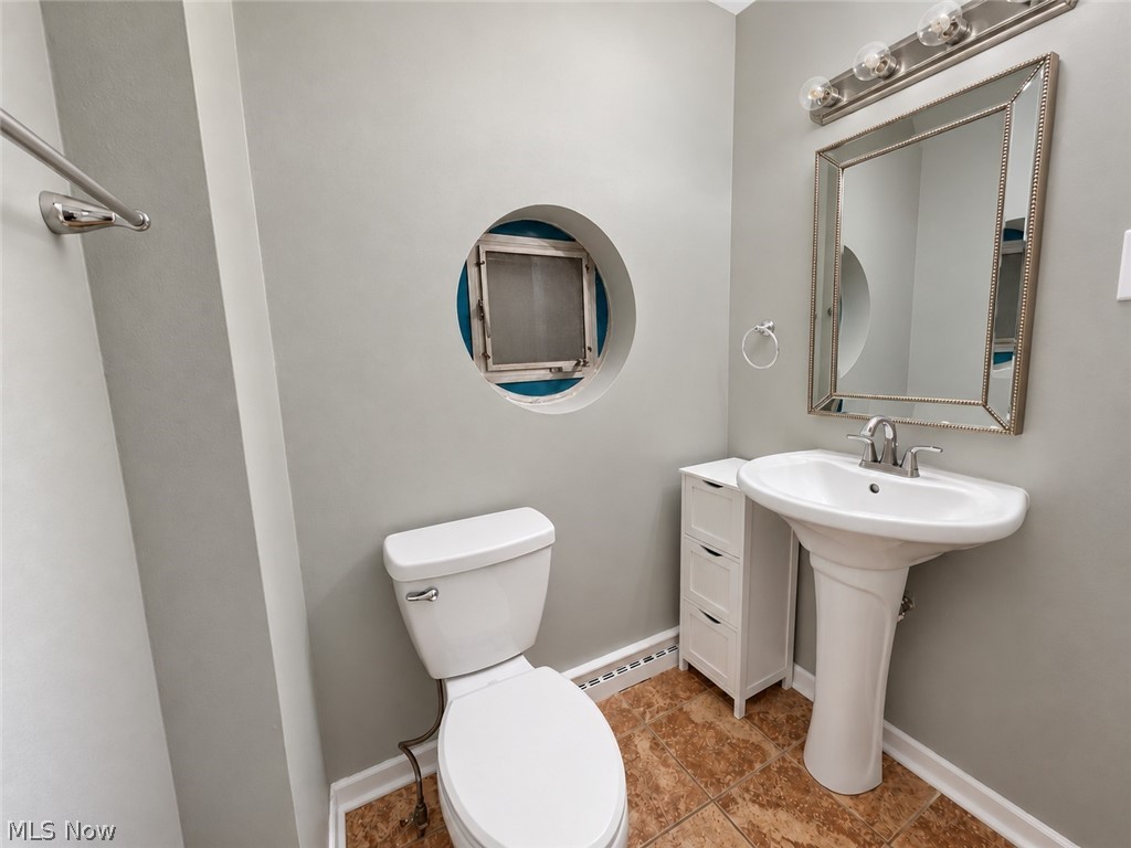 2961 Chamberlain Road Akron, OH 44333 - Photo 14 of 18 Ensuite bathroom with pedestal sink and shower.