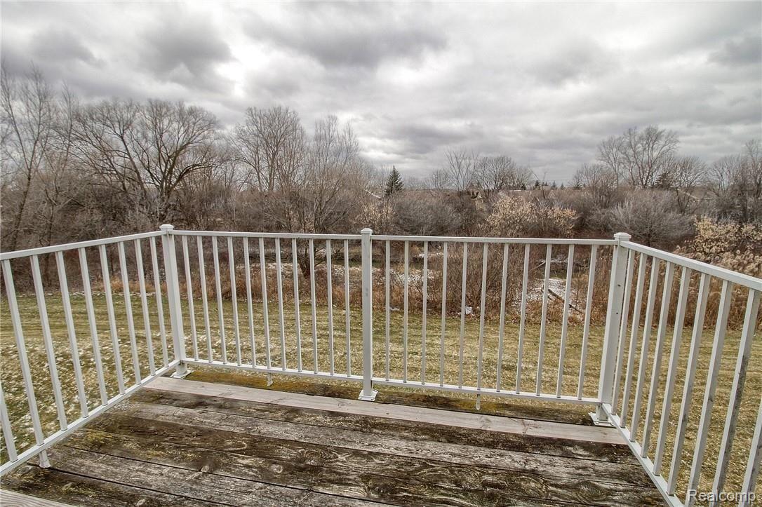 45505 Heather Ridge Drive, Unit 97 Macomb, MI 48044 - Photo 25 of 28 25-Balcony.jpg