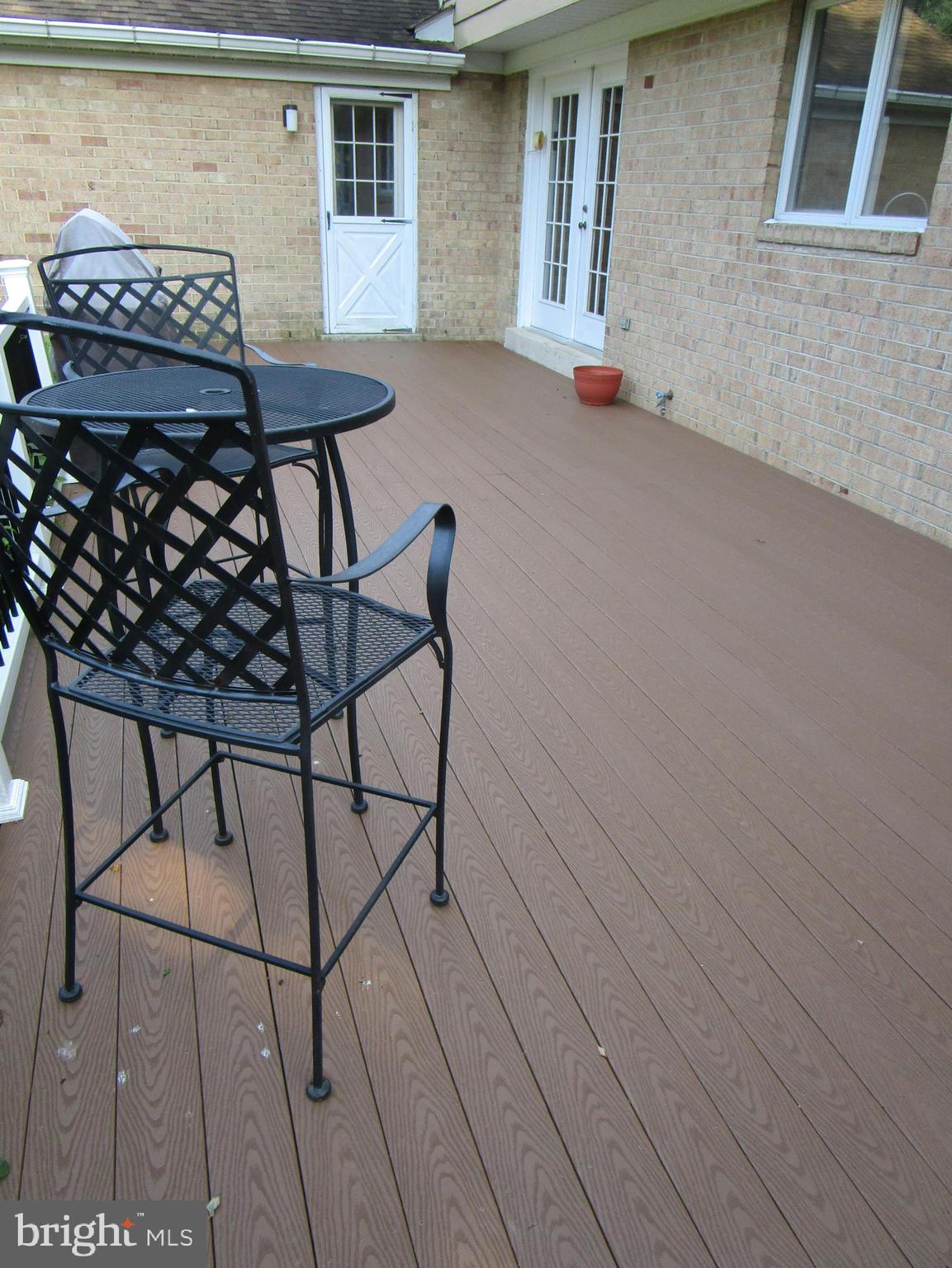 8505 Edenton Road Fulton, MD 20759 - Photo 12 of 38 a backyard of a house with table and chairs