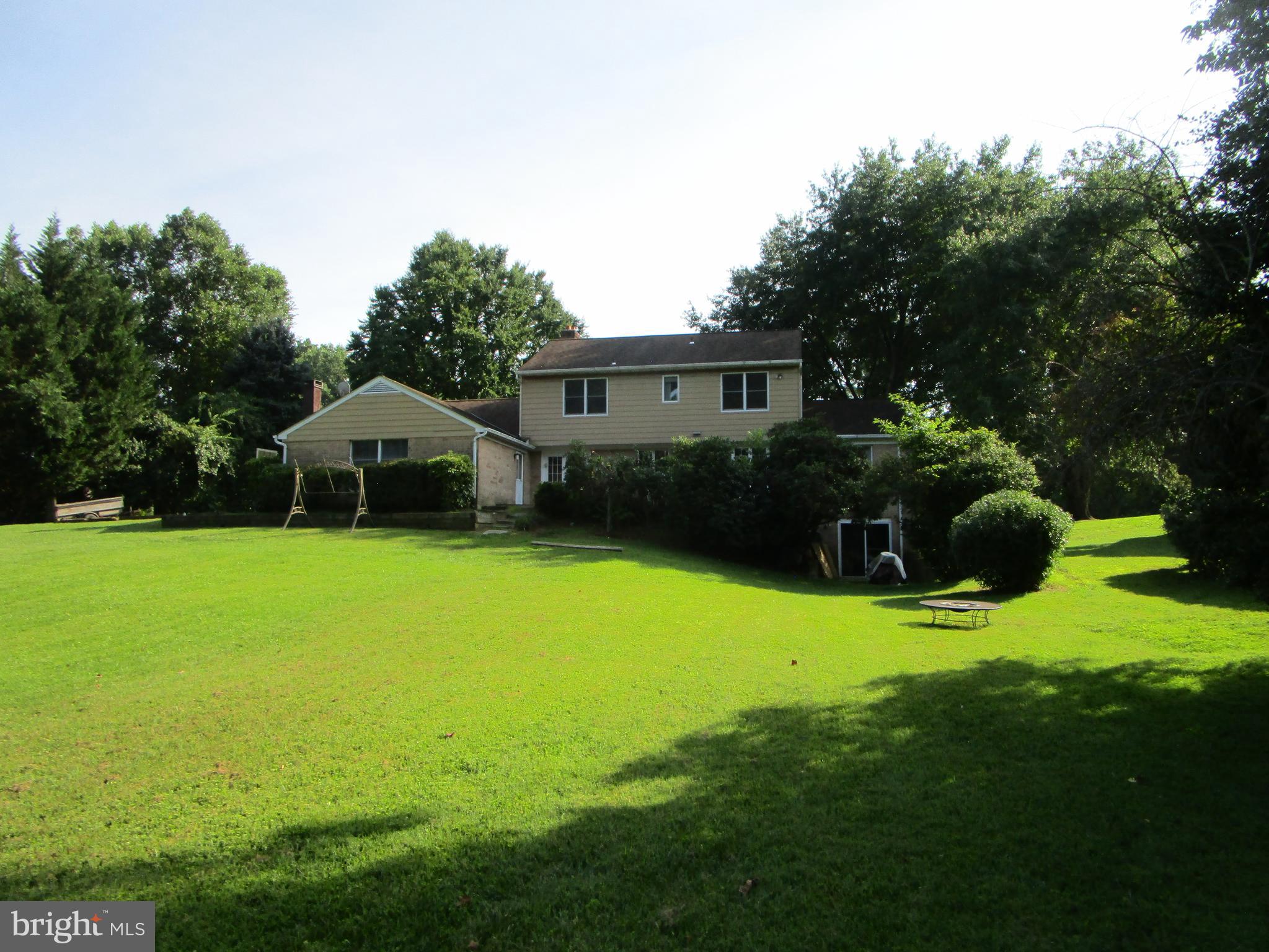 8505 Edenton Road Fulton, MD 20759 - Photo 14 of 38 a front view of house with yard and green space