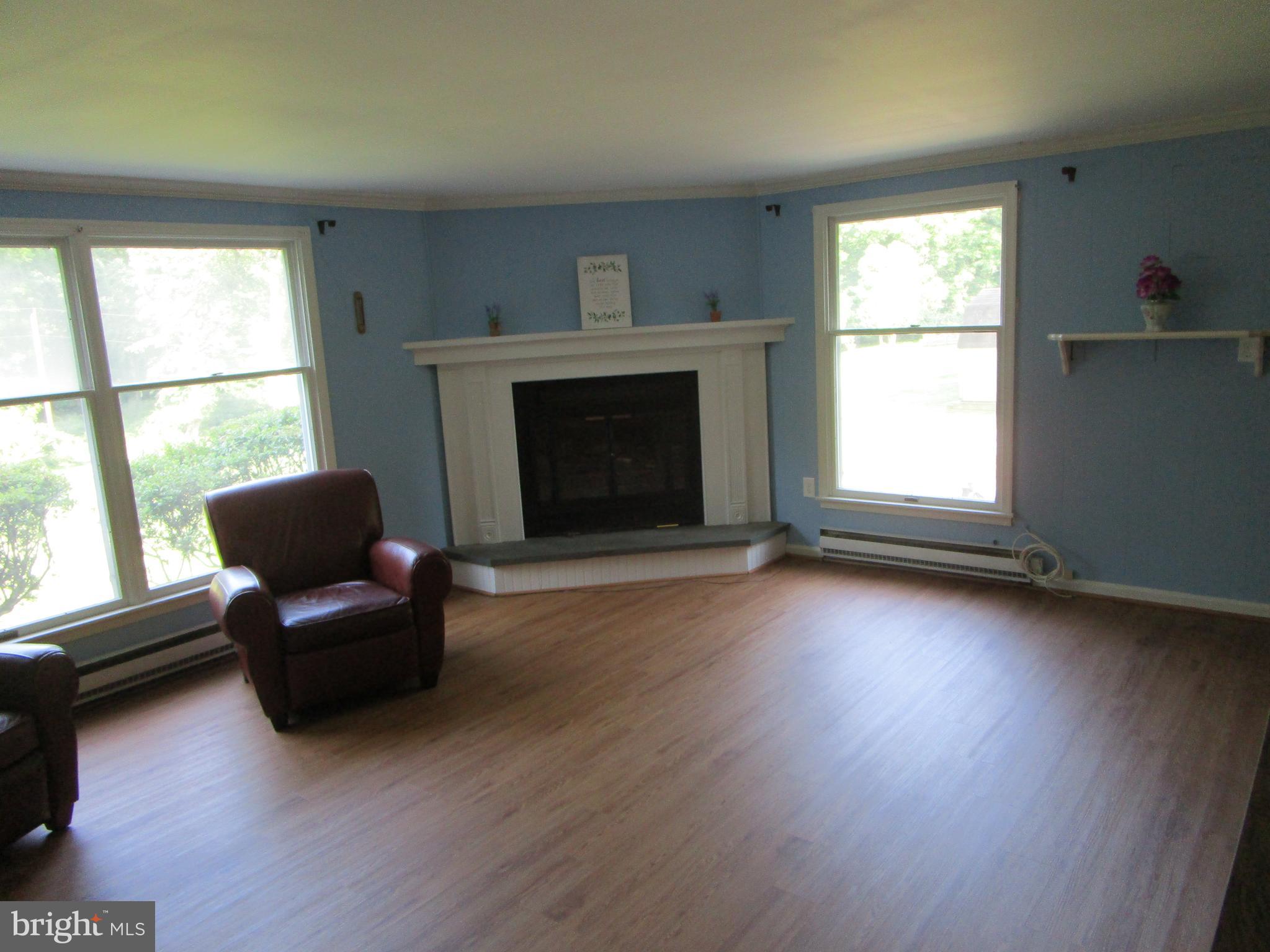 8505 Edenton Road Fulton, MD 20759 - Photo 17 of 38 a living room with furniture and a fireplace