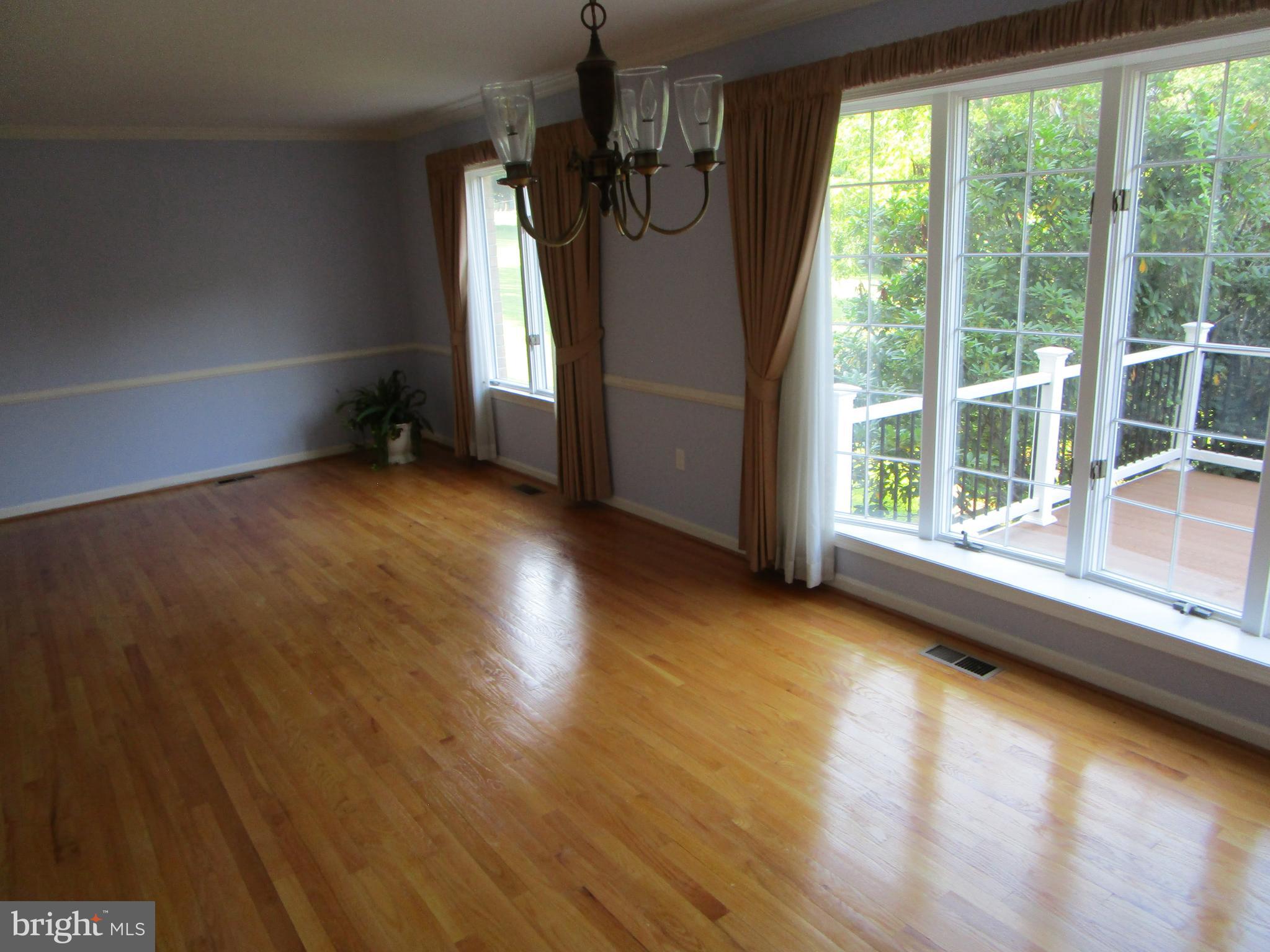 8505 Edenton Road Fulton, MD 20759 - Photo 19 of 38 a view of a room with wooden floor and windows