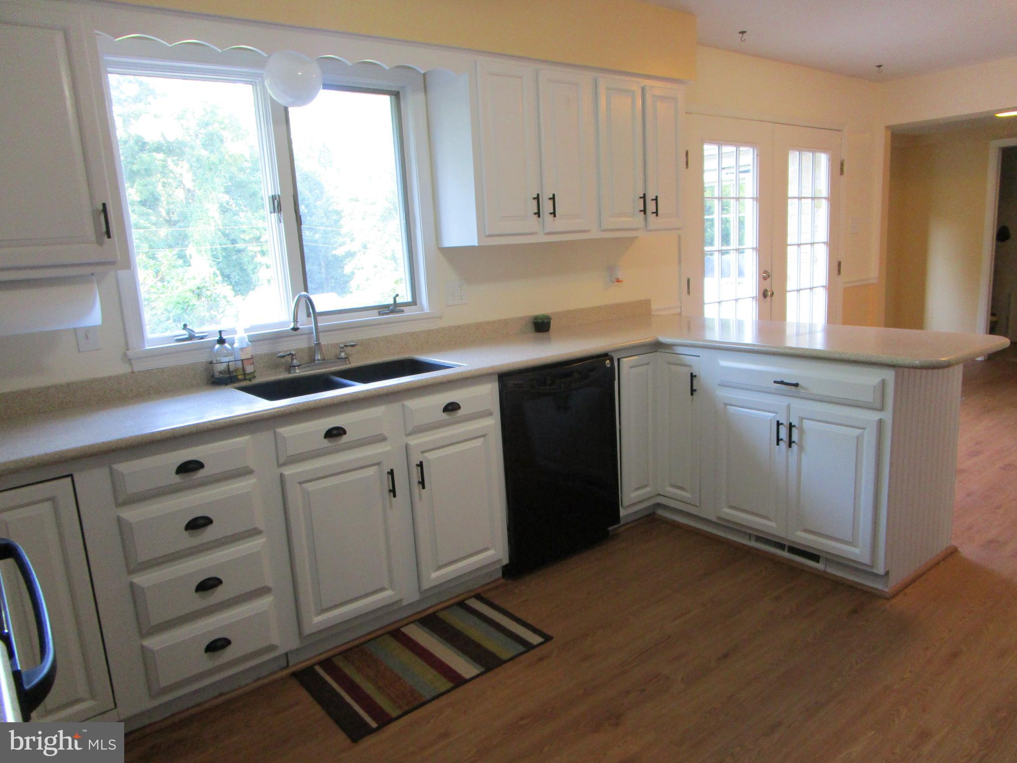 8505 Edenton Road Fulton, MD 20759 - Photo 20 of 38 a kitchen with appliances cabinets and a sink