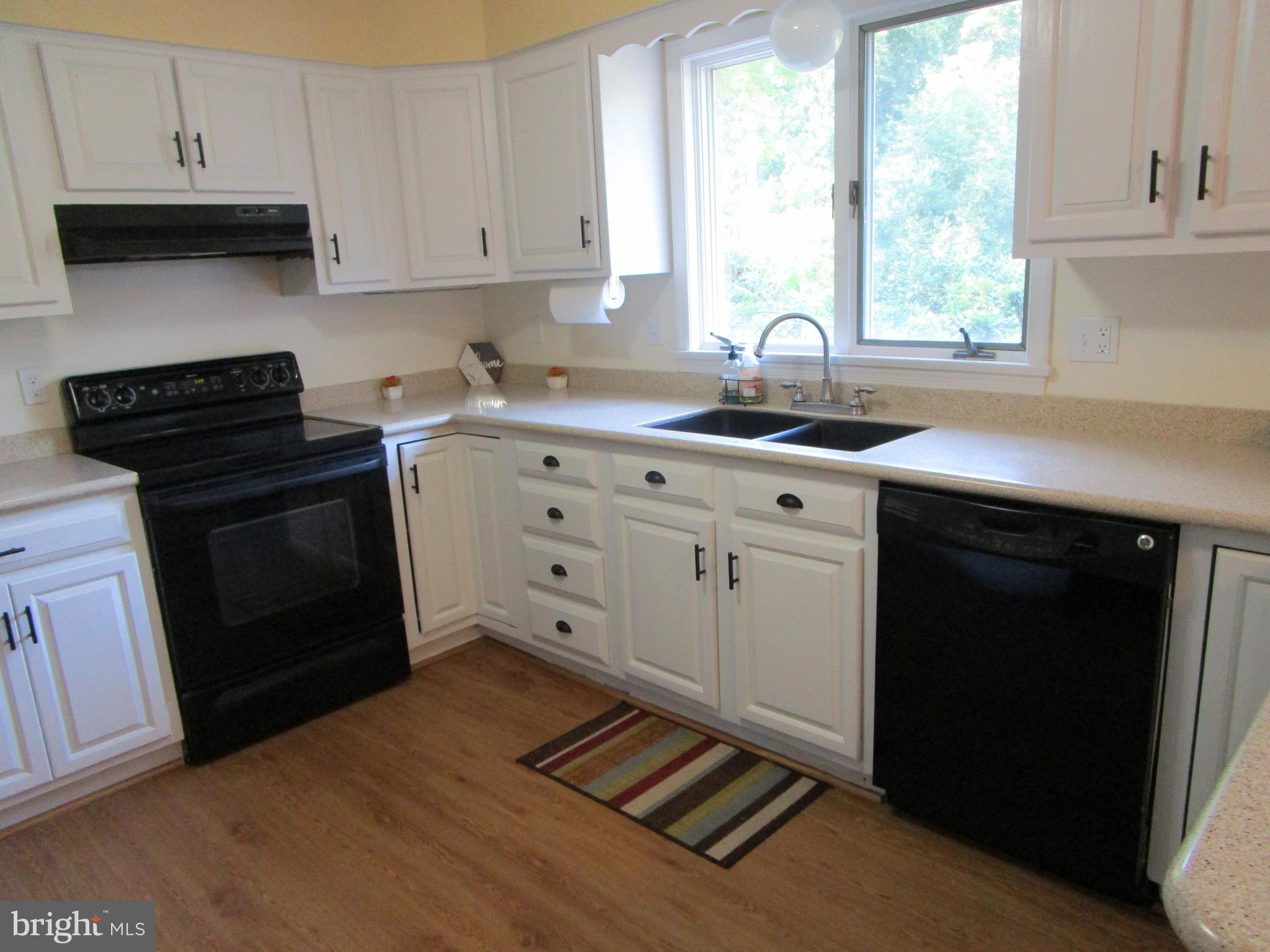 8505 Edenton Road Fulton, MD 20759 - Photo 24 of 38 a kitchen with appliances cabinets and a window