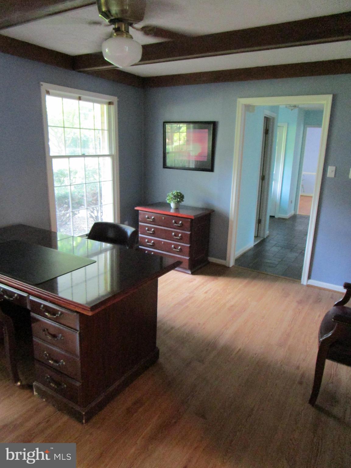 8505 Edenton Road Fulton, MD 20759 - Photo 27 of 38 a living room with furniture and a flat screen tv