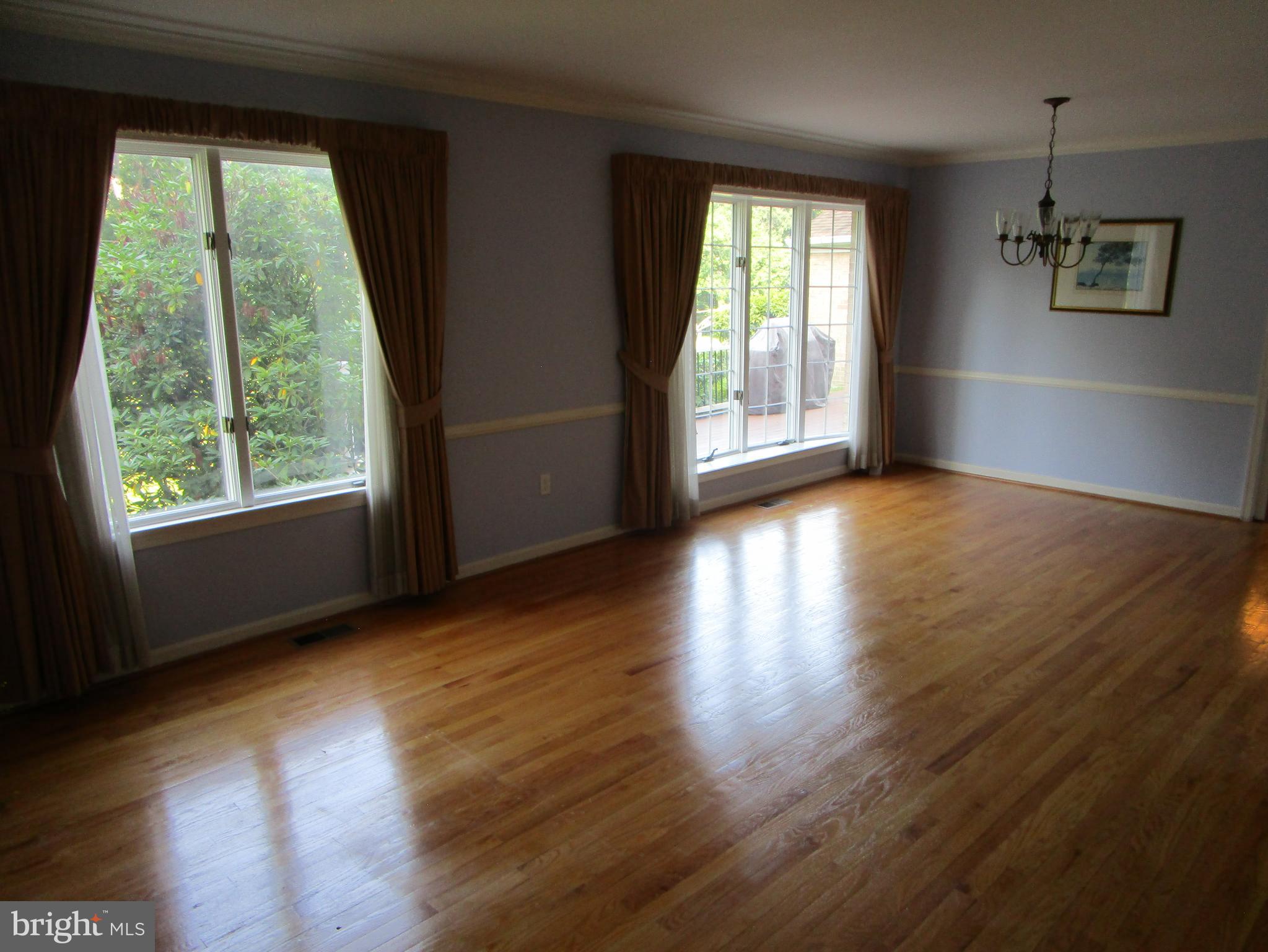 8505 Edenton Road Fulton, MD 20759 - Photo 28 of 38 a view of an empty room with wooden floor and a window