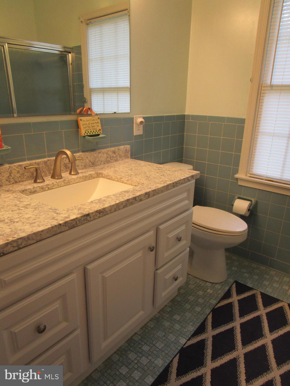 8505 Edenton Road Fulton, MD 20759 - Photo 33 of 38 a bathroom with a sink a toilet and a mirror