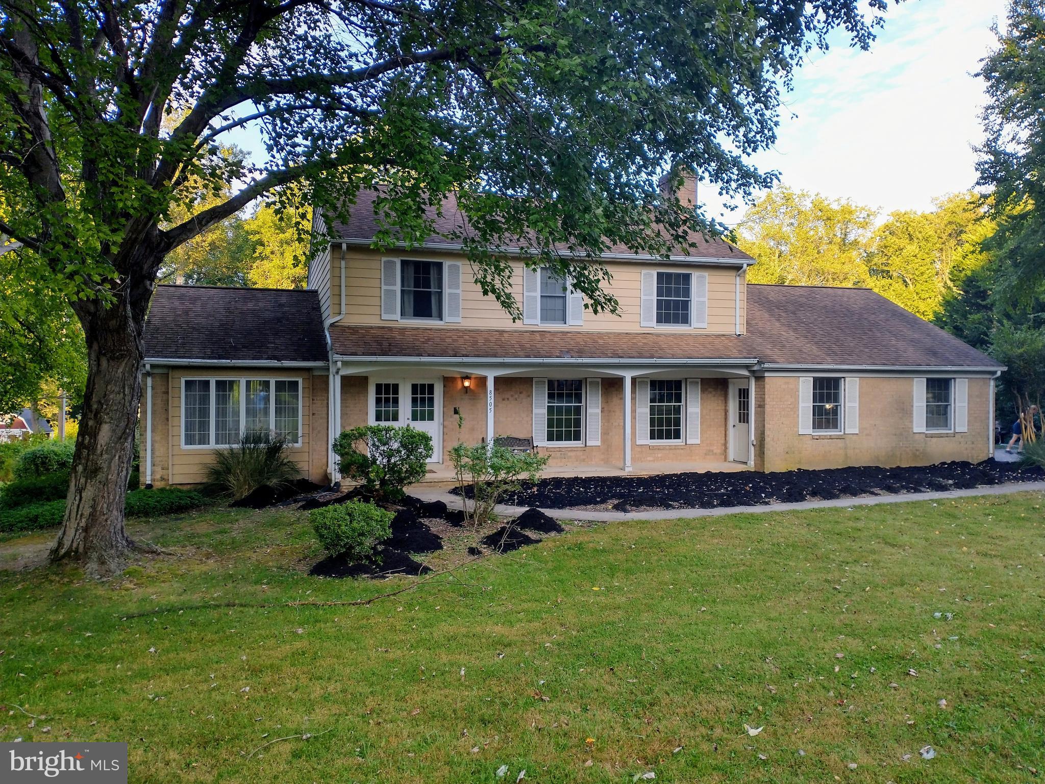 8505 Edenton Road Fulton, MD 20759 - Photo 6 of 38 a front view of a house with a garden