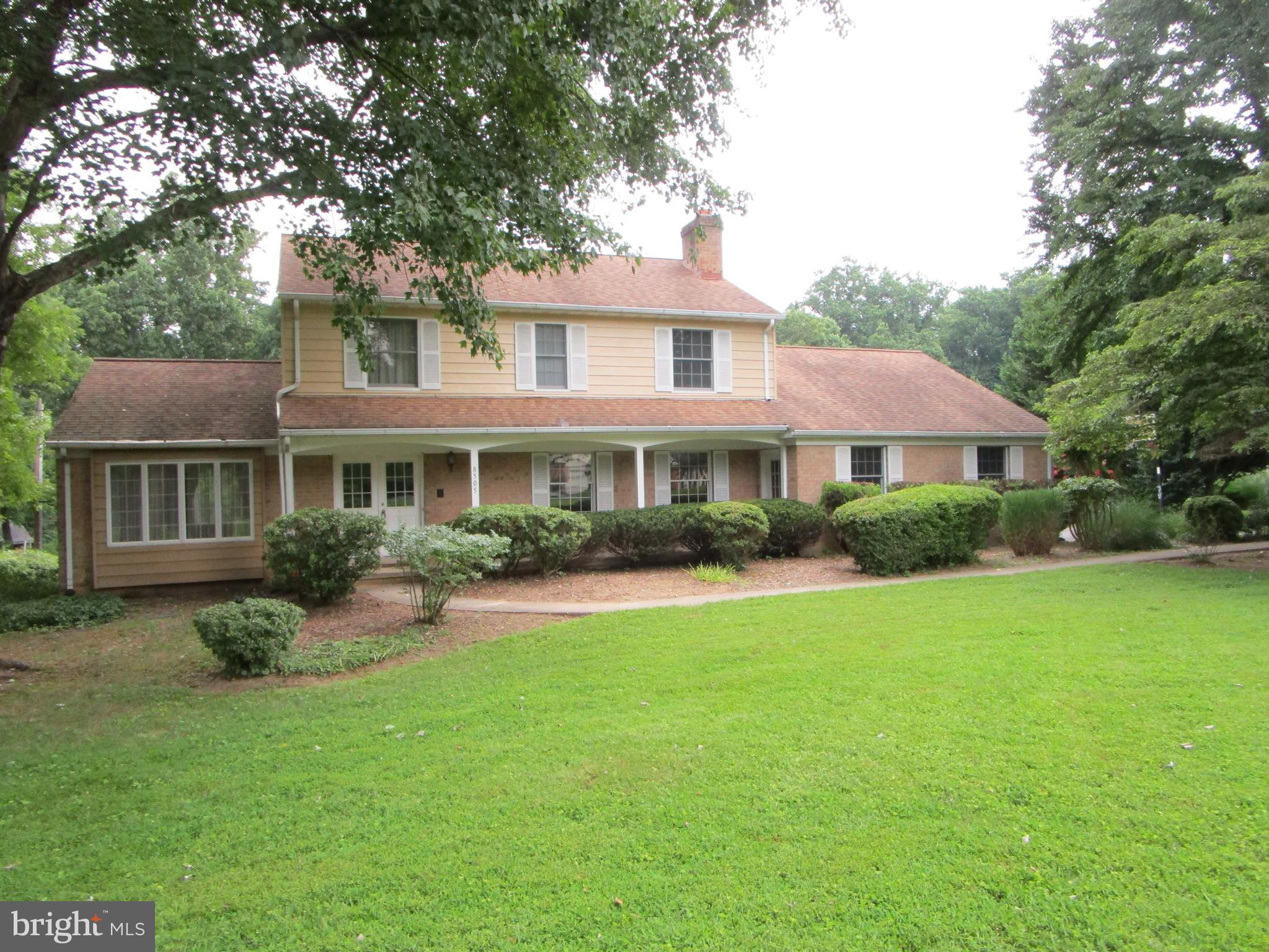 8505 Edenton Road Fulton, MD 20759 - Photo 7 of 38 a front view of a house with a yard and porch
