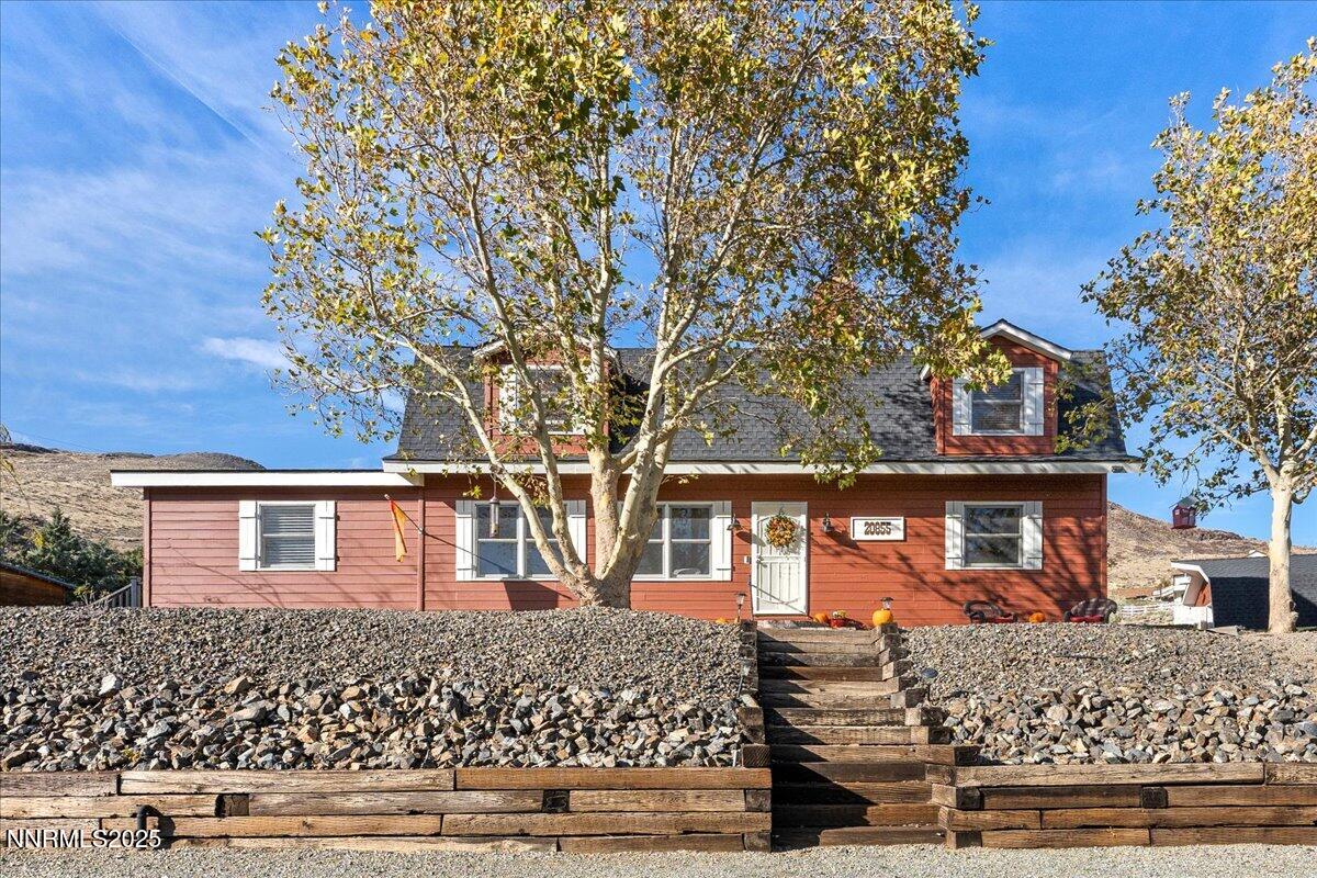 20855 Ames Lane Reno, NV 89521 - Photo 3 of 66 front view of a house with a tree