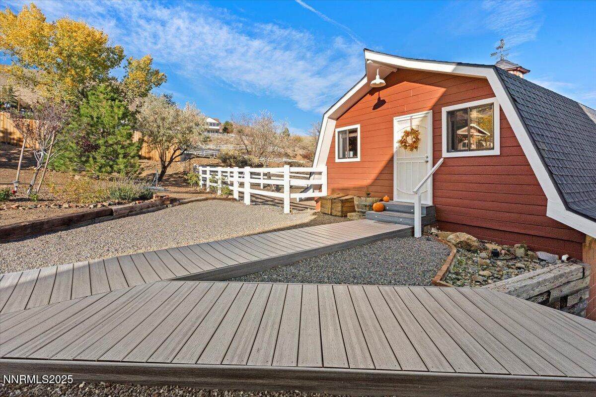 20855 Ames Lane Reno, NV 89521 - Photo 35 of 66 a front view of a house with a yard